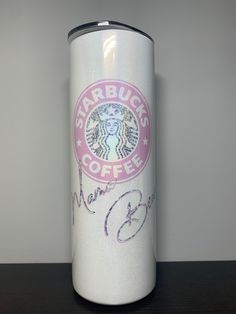 a starbucks coffee can sitting on top of a table