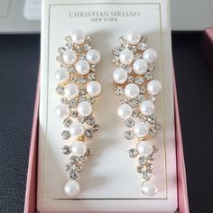 Christian Seriano Pierce Pearl And Rhinestone Earrings Beautiful Gold Drop Earrings With Pearls And Wine Stones Pierced White Rhinestone Bridal Earrings For Formal Occasions, Formal White Rhinestone Bridal Earrings, Formal White Bridal Earrings With Rhinestones, White Party Earrings With Bling, Elegant White Rhinestone Bridal Earrings, White Bling Earrings For Party, Elegant White Bridal Earrings With Rhinestones, Party White Bling Earrings, White Rhinestone Bridal Earrings For Gift