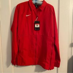 Nike Women’s Midweight Sideline Athletic Football Red Jacket - Large - Nwt Women’s Large Pit To Pit: 21” Length: 28” Brand New With Tags, Never Worn Full-Zip, Pockets With Magnetic Closure No Hood Retail- $135 University Red Long Sleeve Sports Outerwear, Red Nike Windbreaker For Winter, Nike Red Winter Windbreaker, Red Nike Outerwear For Spring, Nike Red Outerwear With Pockets, Red Nike Outerwear With Pockets, Cropped Half Zip, Half Zip Windbreaker, Nike Sportswear Women