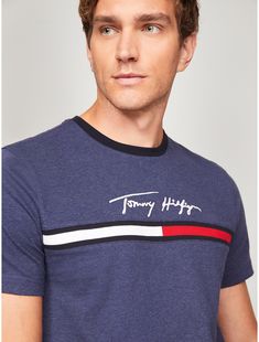 Tommy Hilfiger men's T-shirt. Made from premium cotton and cut in an easy fit, our tee is a soft, comfortable layer. This version is finished with our Hilfiger signature flag logo.  Material: 100% Cotton. Summer Short Sleeve T-shirt With Signature Stripes, Cotton Crew Neck T-shirt With Flag Print, Cotton T-shirt With Three Stripes Branding, Crew Neck, Adidas Cotton Crew Neck T-shirt, Casual T-shirt With Signature Stripes And Short Sleeves, Casual Crew Neck Tops With Signature Stripes, Sporty Cotton T-shirt With Flag Print, Short Sleeve Cotton Tops With Signature Stripes, Blue Short Sleeve Tops With Signature Stripes