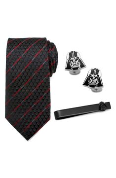 Bring balance to the Force with this iconic gift set featuring a silk tie, cuff links and tie bar that make a space for the Sith Lord at your formal events. Set includes tie, cuff links and tie bar Tie is 3" width; 58" length Tie bar is 2" x 3/8" Cuff links are 3/4" diameter Tie is 100% silk; cuff links and tie bar are silvertone/black plate Spot clean Imported Officially licensed by LucasFilm Ltd. Enamel Cufflinks, Star Wars Wedding Theme, Imperial Officer, Nerd Wedding, Star Wars Accessories, Star Wars Wedding, Bar Gift, The Sith, Mini Collection