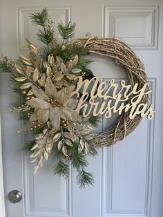 a christmas wreath hanging on the front door