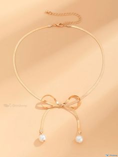 OrcaJump - Refined Bowknot Pendant Necklace adorned with Imitation Pearls Adjustable Necklace With Decorative Bow For Party, Adjustable Necklace With Decorative Bow, Adjustable Gold Jewelry With Decorative Bow, Adjustable Party Jewelry With Decorative Bow, Chic Adjustable Jewelry With Bow Detail, Chic Adjustable Jewelry With Bow, Season Activity, Seasons Activities, Style Elegant