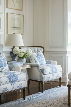 a living room with blue and white furniture