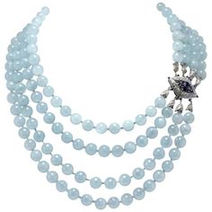 SHIPPING POLICY: No additional costs will be added to this order. Shipping costs will be totally covered by the seller (customs duties included). PS: THIS POLICY IS NOT APPLICABLE TO ITEMS WITH FIX PRICE, ITEMS AT AUCTIONS AND ONGOING PROMOTIONS. Classic and charming aquamarine beads necklace , embellished with a clasp of 18 Kt white gold composed of diamonds and blue sapphires cabochon cut. Tot weight 270.5 g Aquamarines 249.70 g Diamonds 2 ct Blue Sapphires 2.96 ct Rf. guacu For any inquiries, Woman Jewelry, White Gold Necklace, Aquamarine Necklace, Aquamarine Beads, Gold Bead Necklace, Gold Diamond Necklace, White Gold Necklaces, White Necklace, Handcrafted Necklace