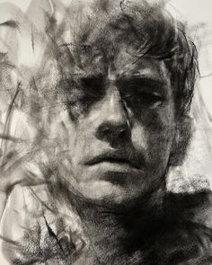 a black and white drawing of a man's face