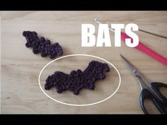 crochet bats are being made with scissors and yarn