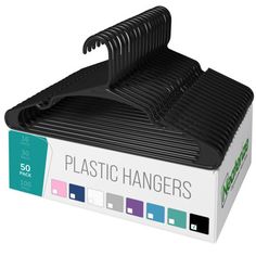 a black plastic hanger on top of a white box with different colors and sizes