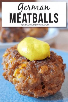 german meatballs with yellow butter on top and the title overlay reads, german meatballs