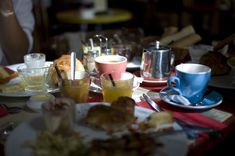 a table full of food and drinks on it