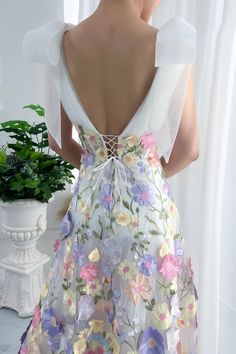 Feminine Floral Embroidered Dress For Garden Party, Elegant Embroidered Dress With Floral Applique For Garden Party, Spring Banquet Dress With Bow Detail, Spring Banquet Dress With Bow, Summer Floral Embroidered Organza Dress, Spring Prom Dress With Intricate Embroidery, Spring Banquet Dress With Floral Embroidery, Summer Banquet Dress With Floral Applique, Feminine Floral Print Embroidered Wedding Dress