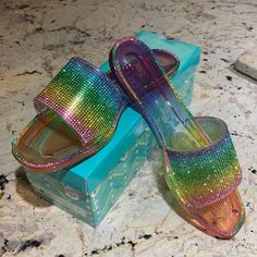 Anna Crystal Rainbow Jelly Slippers. Never Worn And With Original Box! Rainbow Round Toe Sandals For Party, Rainbow Sandals With Round Toe For Party, Multicolor Flat Sandals For Parties, Trendy Rainbow Synthetic Sandals, Trendy Multicolor Flat Heel Sandals, Trendy Multicolor Slip-on Heels, Colorful Casual Party Heels, Casual Colorful Heels For Party, Rainbow Jelly