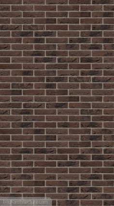 a brick wall that is brown and black