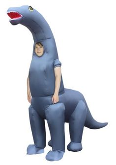 a man in a blue dinosaur costume standing next to a child