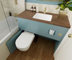 a bathroom with a toilet, sink and bathtub is shown in this image from the front view