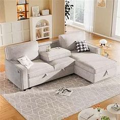 a living room scene with focus on the sectional sofa