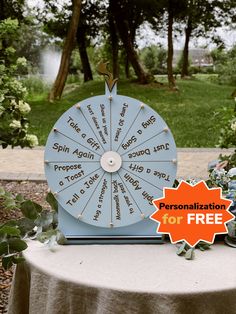 a table topped with a blue wheel of fortune