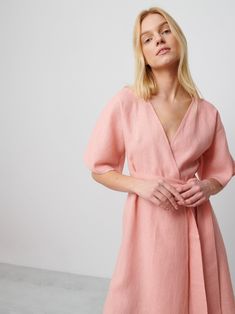 "MARY is a short sleeve, robe style linen wrap dress with a self tie belt. DETAILS - Self tie belt with no closure or belt loops - Dolman style sleeves - Knee length - 100% lightweight European linen fabric - Cut and sewn to order just for you in our studio COLOR - Pink Spanish, you can also choose other colors above - Fabric samples are available here https://www.etsy.com/listing/586569696/linen-fabric-samples SIZING & FIT - Relaxed fit - True to size - Model is 5'8\" / 173cm and wearing a size S CARE FOR LINEN - Machine wash up to 30ºC/86ºF gentle cycle - Lay flat to dry or tumble dry low - Warm iron if needed - Do not bleach SIZE GUIDE Size conversion guide Size XS (US 0-2, IT 36-38, UK 4-6, Japan 3-5, France 32-34) Size S (US 4-6, IT 40-42, UK 8-10, Japan 7-9, France 36-38) Size M (US Belted Short Sleeve Wrap Dress For Brunch, Short Sleeve Wrap Dress With Tie Waist For Brunch, Spring Linen Belted Dress, Summer Belted Dress With Tie Waist For Brunch, Summer Brunch Belted Dress With Tie Waist, Belted Linen Wrap Dress, Spring Short Sleeve Linen Dress With Belt, Spring Short Sleeve Belted Linen Dress, Daywear Belted Wrap Dress