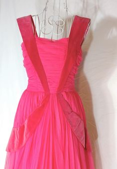 Vintage Pink Ball Gown Dress, Pink Pleated Bodice Evening Dress For Cocktail, Vintage Pink Evening Dress For Wedding, 1950s Style Pink Party Dress, Vintage Pink Dress For Prom Season, Vintage Pink Dress For Prom, Pink Vintage Dress For Prom Season, Vintage Pink Cocktail Dresses, Vintage Sleeveless Evening Dress For Prom Season