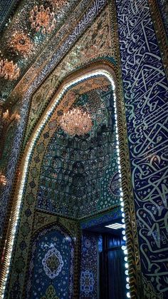 an intricately decorated building with chandeliers and lights