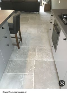 the kitchen is clean and ready to be used as a living room or dining area