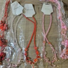 This Listing Is For The Exact Item As Shown In The Photos. New With Tags Pink, Red & White Valentine's Day Beaded Necklace Bundle Costume Jewelry Lot. This Costume Jewelry Lot Includes 3 Pieces Of Fashion Costume Jewelry. Materials Include Glass Beads, Acrylic Beads, And Waxed Cotton Cord For The Neck Strap. Three Of The Necklaces Are About 16" Long And The 2 Tassel Necklaces Are About 30" Long. Please Refer To Photos And Ask Me Any Questions Before Making An Offer. Design Themes: Romance Romant Trendy Red Beaded Necklace For Party, Valentine's Day Pink Beaded Necklaces, Offer Design, Jewelry Materials, Design Themes, Hippie Festival, Fashion Costume, Source Unknown, Love Valentines