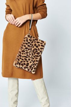 Elevate your outfit with this luxury faux fur clutch bag, featuring a side zipper and removable wrist strap.  With a wide variety of print patterns and colours available, there's a clutch for every outfit.  Luxury faux fur animal print clutch bag. Fur Clutch Bag, Fur Clutch, Fur Animal, Faux Fur Bag, Envelope Clutch Bag, Fur Bag, Printed Clutch, Envelope Clutch, Original Card