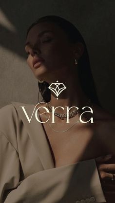 a woman with her hand on her chest and the word vera in front of her