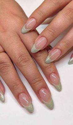 Step into the world of elegance this spring with a stunning array of sage green nails that'll add a touch of glamor to your manicure. #greennaildesign Green Nails Bridesmaid, Cute Simple Nails Sage Green, Bridal Nails Sage Green, Simple Short Nail Designs Green, Iridescent French Tip Nails Almond, Sage Nails Ideas, Sage Green Nails With Glitter, Cute Sage Green Nails Short, Green Blush Nails