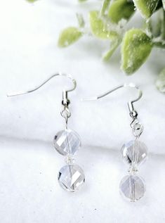 Handcrafted Clear Faceted Flat Glass Bead Dangle Drop Earrings. They are the perfect earrings for any occasion. Pairs well with any casual outfit and makes a great gift for family and friends-- Clear Faceted Flat Glass Beads. Perfect for a Christmas Gift, Birthday or anniversary. Gift for her. SHIPPING:  PROCESSING TIME IS CURRENTLY 1-2 DAYS FROM THE DATE OF PURCHASE. Processing time does not include shipping which is an extra 3-5 days. You will receive an email with tracking information once yo Beaded Dangles, Earring Backs, Gifts For Family, Beaded Earrings, Jewelry Earrings Dangle, Glass Beads, Dangle Drop Earrings, Dangle Earrings, Christmas Gifts