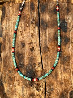 This is a great little choker! It was made using 4mm heishi beads and some 925 silver pearls on the ends. All the stones are genuine Kingman turquoise, genuine red coral, genuine black onyx and genuine riverstone. It will look great with a variety of clothing and it will soon become one of your favorites to wear. Length 15" $72 Choker C371 Turquoise Beaded Choker, Turquoise Beaded Choker For Gift, Turquoise Beaded Chain Choker, Gift Turquoise Beaded Choker, Adjustable Turquoise Bead Choker, Kingman Turquoise, Heishi Beads, Red Coral, Silver Pearls