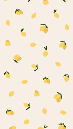 lemons are flying in the air with green leaves on them, and yellow background