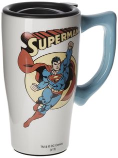 a ceramic coffee mug with superman on it