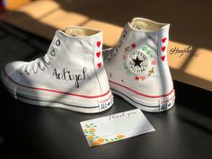 Custom embroidery converse sneakers | name embroidered shoes/Custom converse high tops embroidered  name /personalized nam and wedding date  💸 Price includes Converse Shoes and floral embroidery as shown 🌸 You can send me your Converse/Vans shoes or I can buy them for you. We stock all the Converse and Vans shoes you want, if you want other Converse/Vans shoes in the store, please message us. Your embroidered Converse/Vans shoes will be available for shipping in 7-15 days. 🌸 I started hand embroidering on fashionable clothes and handbags over 20 years ago - and now on CONVERSE/VANS shoes, an American icon, a must-see classic! I'm excited to give your Chuck Taylor shoes a new look with beautiful, nature-inspired embroidery. All images, designs and text used by CUSTOMSHOEDESIGNSOHO are co Shoes For Bridal, Custom Converse High Tops, Embroidered Shoes Converse, Embroidery Converse, Converse Chuck 70s, Converse 1970s, Birthday Shoes, Chuck Taylor Shoes, Embroidered Converse