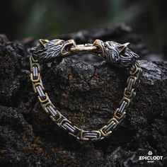 In Norse mythology, Geri and Freki are the faithful wolf companions of Odin, the Allfather. This Viking bracelet, with its exquisitely detailed depictions of these legendary beasts, is a tribute to the sacred bond between god and animal, and the power of loyalty and friendship. Crafted from robust stainless steel, it is a piece of Viking jewelry that is built to last, a symbol of the enduring strength of the Norse spirit. Wear it, and carry with you the courage and wisdom of Odin, the fierce pro Mythical Wolves, Geri And Freki, Nordic Symbols, Viking Aesthetic, Mjolnir Pendant, Viking Shield, Norse Jewelry, Celtic Trinity Knot, Inner Warrior