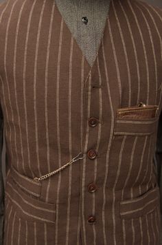 Made in soft striped cotton in dark brown color. Back panel in Belgian linen in officer olive color. Fully lined in soft cotton. Dark brown corozo buttons. We have revamped the vest of our waistcoat to be less slim. Slightly lower the armhole for more comfort. Chest pocket deeper for most phones, eyeglass case (leather eyeglass case not included). Two lower pockets plus one pocket for wrist watch. One big inside pocket. Size S: chest 38" Size M: chest 40" Size L: chest 42" Size XL: chest 44" Siz Leather Eyeglass Cases, Boiled Wool, Dark Brown Color, Belgian Linen, Olive Color, Eyeglass Case, Pocket Size, Vintage Wool, Chest Pocket