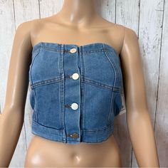 New Super Cute Denim Bustier Good Condition New Open With Buttons On The Front And On The Back It Has Stretched Pleats Size Medium Made In China Day Out Medium Wash Denim Vest With Button Closure, Blue Denim Vest With Button Closure For Day Out, Fitted Denim Top With Snap Buttons For Spring, Denim Top With Buttons For Day Out, Blue Denim Top With Buttons For Day Out, Blue Buttoned Denim Top For Day Out, Summer Denim Jacket With Button Closure For Day Out, Fitted Denim Jacket With Button Closure For Summer, Chic Light Wash Buttoned Denim Top