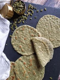 there are some pita breads on the table