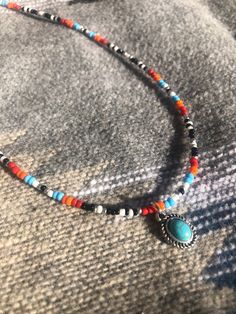 Multi color beaded necklace and faux turquoise charm Crafts Business Ideas, Color Beaded Necklace, Seed Bead Ideas, Diy Western, Coos Bay, Turquoise Charm, Turquoise Pendant Necklace, Native American Beadwork, Southwest Jewelry