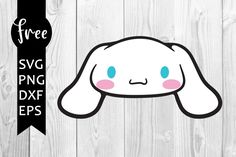 a white bunny face with blue eyes and pink cheeks on a wooden background, with the words free svg png dxf files