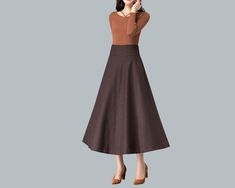 * A high-end long wool skirt with wide hem, very cool. * Made of wool blends, fully lined and with two side pockets. * Fixed waist with wide waistband and side invisible zipper. * Can custom make waist size and skirt length. * Material: Outer-50% wool, 50% polyester; lining-100% polyester * Washing instructions: Dry Clean Only * Size: True to US size, US 0-US 20 are available, you can let us know your usual size and height in your order. * Shipping: Free shipping Processing time : 5-7 Business d Brown Maxi Skirt With Pockets For Fall, Flared Maxi Skirt For Fall Workwear, Flared Maxi Skirt For Fall Office Wear, A-line Maxi Skirt For Fall Workwear, Brown Flared Maxi Skirt For Fall, Brown Maxi Skirt For Workwear And Fall Season, Brown Maxi Skirt For Workwear In Fall, Fall Solid Color Full Maxi Skirt, Brown Flared Maxi Skirt For Work