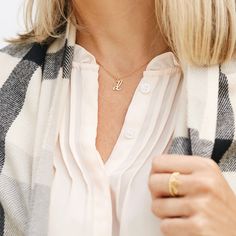 Understated and chic, the Nella Mini Initial Pendant lets you wear your initial or the initial of someone you love with a lowercase letter charm that can be worn on its own or layered with other pieces. Available in sterling silver, 18k gold plated or 18k rose gold plated silver Size: 1/4 to 1/2" (varies by letter) 16" cable chain with 2" extender Spring ring closure Made in the USA This is a lowercase only font, uppercase letters entered will be produced as lowercase This item is FINAL SALE and Tan Monogram Initial Pendant Necklace, Tan Initial Pendant Necklace, Rose Gold Initial Pendant Name Necklace, Classic Monogram Initial Necklace, Elegant Personalized Tan Initial Necklace, Yellow Gold Monogram Initial Necklace, Monogram Initial Pendant Name Necklace, Elegant Monogram Initial Pendant Necklace, Classic Monogram Initial Necklace For Everyday