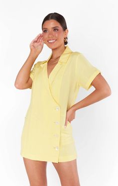 Show Me Your Mumu Color: Butter Yellow 55% Cotton, 45% Viscose Hand Wash Cold The Bicoastal Blazer Romper may just be your new brunch bestie! Totally chic, crafted in butter yellow linen with white contrast buttons and side pockets. Style with white platform sneakers for a casual feel or dressed up with heels and dainty jewelry. Blazer Romper, Kenzie Dress, White Platform Sneakers, White Platform, Butter Yellow, Show Me Your Mumu, Show Me Your, Platform Sneakers, Dainty Jewelry