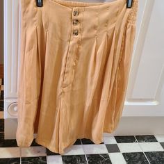 Wide Leg Baggy Style Whorts. Button And Zipper Opening, Pockets And Wide Elastic Waist Band In Back. Waist Across Is 14", Inseam Is 5.5" And Leg Opening Is 15 1/4". Nice Casual Wide Leg Shorts With Buttons, Wide Leg Buttoned Shorts For Spring, Summer Short Bottoms With Buttons, Wide Leg Pants With Built-in Shorts For Day Out, Wide-leg Pants With Built-in Shorts For Day Out, Summer Short Pants With Buttons, Summer Short Pants With Button Closure, Spring Short Pants With Button Closure, High-waisted Shorts With Buttons For Day Out