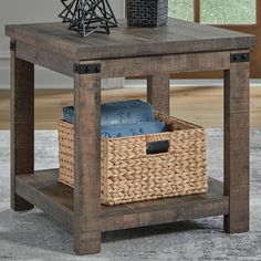 an end table with a basket underneath it