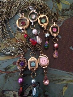 Repurposed watch cases in a rainbow of colors. ~my rogue heart Jewelry Repurposed, Watch Ideas, Vintage Jewelry Repurposed, Watch Cases, Junk Jewelry, Watch Jewelry, Vintage Jewelry Crafts