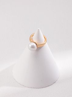 Product Details:Material: S925 silver/natural pearlSize: The pearl is about 11mm, and the adjustable finger ring is about US size 6~8Describe:Introducing our Pearl Ring: A sleek and sophisticated accessory that effortlessly enhances your daily attire. Crafted with genuine S925 silver and adorned with natural pearls, available in both classic silver and vintage gold. Elevate your look with this timeless piece that exudes confidence and refinement. Elegant Everyday Pearl Open Ring, Minimalist Pearl Ring For Wedding, Minimalist Formal Pearl Drop Ring, Minimalist Pearl Drop Ring, Classic White Pearl Ring With Simple Design, Elegant Everyday Pearl Ring With Simple Design, Minimalist Pearl Ring For Formal Occasions, Minimalist Pearl Rings For Formal Occasions, Pearl Drop Open Ring