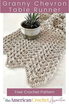 a crocheted table runner with a potted plant on it and the text granny chevron table runner