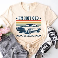 Funny Custom Birthday Party Graphic Tees. I'm Not Old I'm Classic Tshirt, Funny Graphic Mens and Womens T-Shirt, 50th 60th 70th Birthday Gifts for Him Her, Birthday Gift Ideas for Men ---How To Order --- 1-) Please, check and review all photos 2-) Choose your t-shirt size and color 3-) Click add to cart. You can go back to add more product 4-) Click "Proceed to check out" 5-) When you check out, you can add a note to seller for any request 6-) The design will be printed in the color seen in pict Retro White Tops For Anniversary, Classic Letter Print T-shirt For Birthday, Classic T-shirt With Letter Print For Birthday, Classic Letter Print T-shirt For Anniversary, Retro Letter Print Tops For Father's Day, Classic Birthday T-shirt With Letter Print, Classic Graphic Print T-shirt For Birthday, Vintage Letter Print T-shirt For Father's Day, Vintage White T-shirt For Birthday