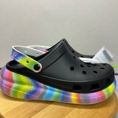 Crocs Classic Crush Spray Dye Clog Size M 13 W 14 Black Multi Platform Rainbow Brand New With Tag Fast Shipping Feel Free To Ask Any Questions Trendy Black Slip-on Clogs, Sporty Platform Clogs With Synthetic Material, Sporty Platform Clogs In Synthetic Material, Trendy Black Round Toe Clogs, Black Flat Clogs With Cushioned Footbed, Comfortable Multicolor Synthetic Clogs, Black Flat Clogs For Beach, Black Flat Clogs For The Beach, Casual Multicolor Platform Clogs